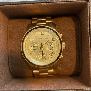 Women’s gold Michael Kors watch, great condition